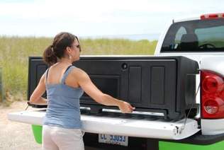 Removable truck bed storage box
