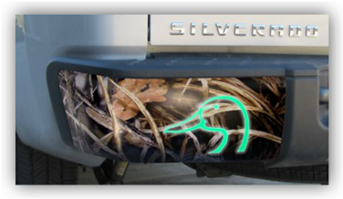 Camouflage BumperShellz Bumper Cover with Ducks Unlimited Logo on Silverado