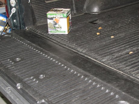 Tailgate gap cover with drop in liner